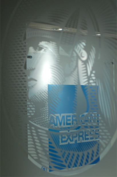 A very cool image of the Amex blue box juxteposed over an image of the Amex Centurian